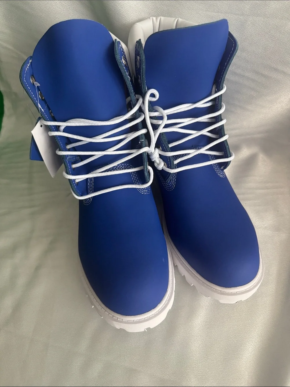 New! Timberland Premium 6-Inch boots featuring a vibrant blue nubuck upper.